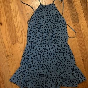 Blue spotted romper from She & Sky. Size small.